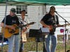 Mike Gordier (from left), Vinnie Pistelli and Bill Gunn, also known as The Sabbs Brothers, perform Saturday at the beer garden.