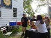 Sean McCarthy, co-owner of Fairfield Craft Ales, serves up a cold drink Saturday at the beer garden.