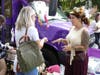 Dayna Kasprzycki, owner of Typsy Gypsy, chats with a customer Saturday.