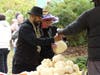 Derrick Martinez and Amanda Balducci purchase produce Sunday from Little River Farm.