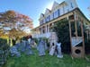 A guillotine is among the set pieces the Finlay family uses for Halloween decor.