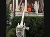 Jeannie Finlay is ready for trick-or-treaters with a skull candy chute.