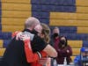Maggie Saleeby and Coach Steve Lapham share a hug after Saturday's big win.