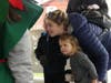 Renee Riendeau scopes out Santa with Cohlby Riendeau (center) and Mason Riendeau.