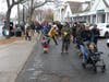 Families line up Sunday to meet Santa.