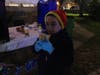 Dylan Shyket, 7, enjoys a cup of apple cider.
