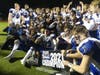 The Darien football team is all smiles after a state title win Saturday.