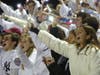 Blue Wave fans cheer on their team Saturday.