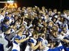 The Darien football team is all smiles after a state title win Saturday.