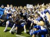 The Darien football team is all smiles after a state title win Saturday.