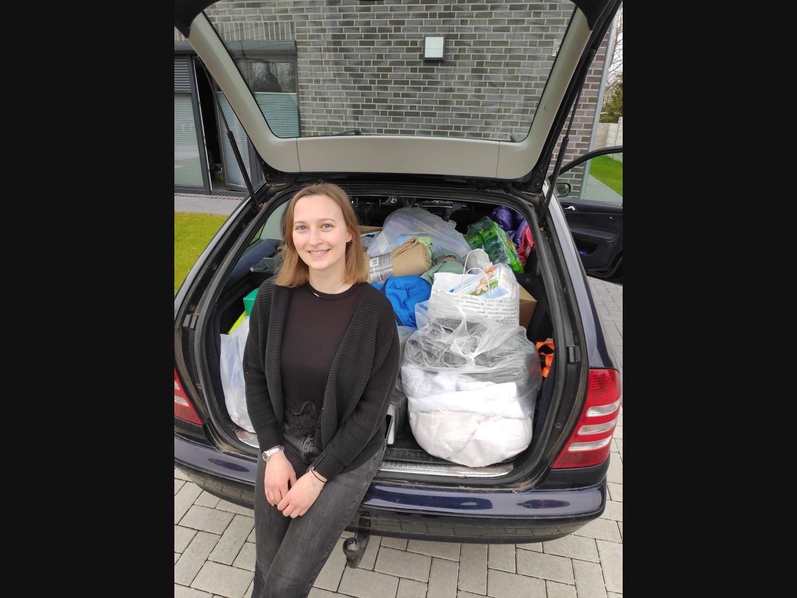 Emily Kilgannon-Neumann is ready to head to Kraków, with a car full of supplies.
