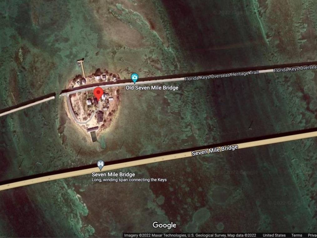 A woman and two children crashed into the Old Seven Mile Bridge while parasailing Monday.