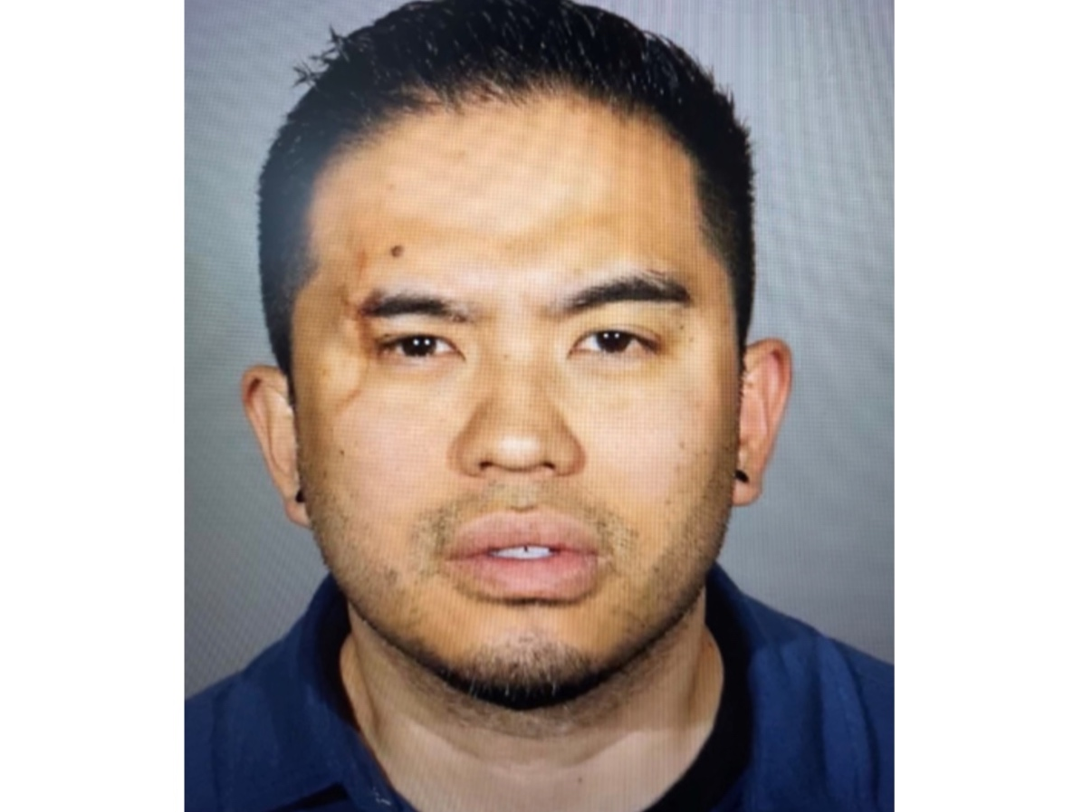 Travis Takeshi Shojinaga, 39, of Sylmar, was arrested Wednesday on campus at Viewpoint School in the 23600 block of Mulholland Highway, authorities said.