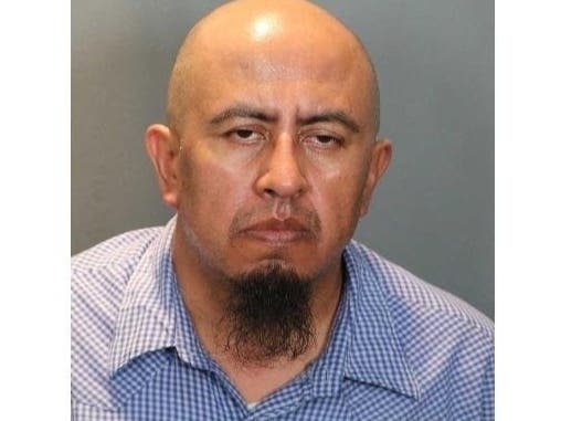 Juan Marquez, 47, was detained Saturday afternoon on an arrest warrant by U.S. Customs and Border Protection as he returned to the U.S., according to police.