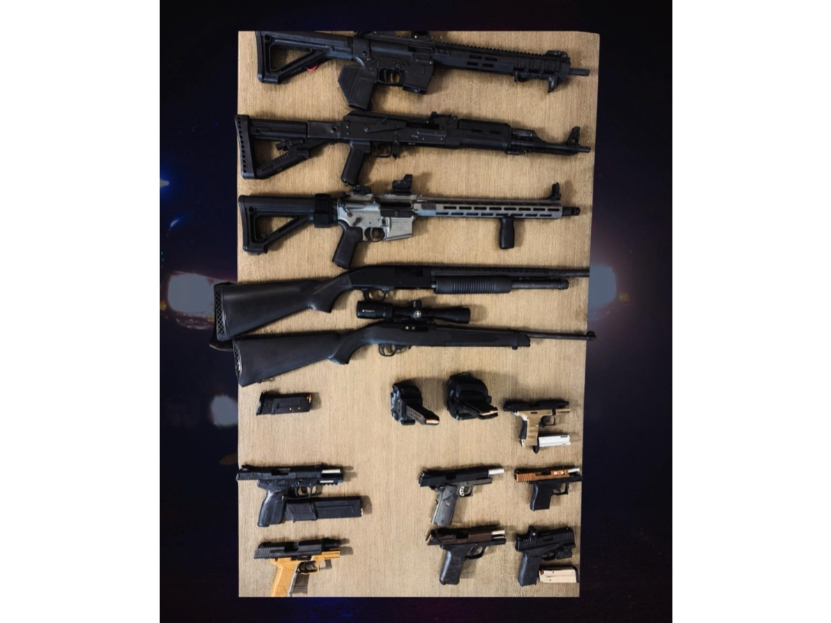 Officers served the search warrant at the residence in the 2000 block of South Flower Street in connection with an investigation of criminal threats, police said Monday in a social media post.
