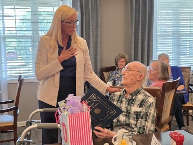 Illinois Senate Minority Deputy Leader Sue Rezin, R-Morris, recently visited Grand Victorian of Sycamore, where she presented a Senate certificate honoring Jack Connerton in celebration of his milestone birthday.