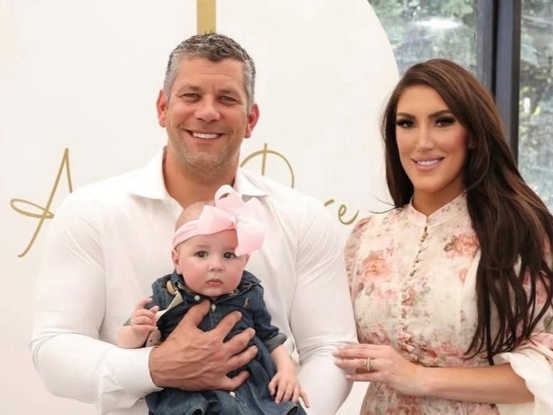 Joe Belgio is seen with his fiancée, Melanie Stayer, and his daughter, Carmela.