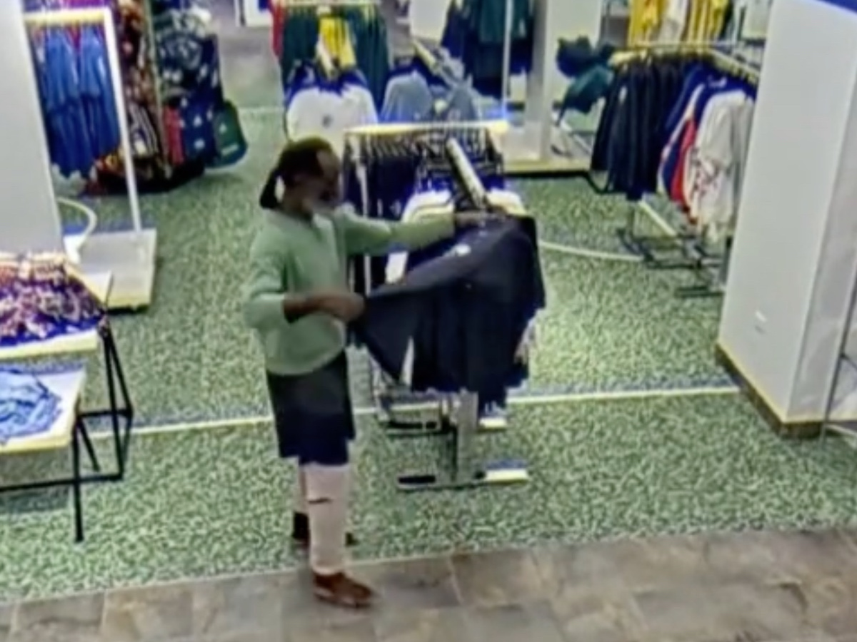 Security footage provided by police shows Roy Pughsley browsing clothing at Macy's.