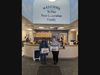 Friends Board Member Maria Dawson delivers books to Next Generation Preschool