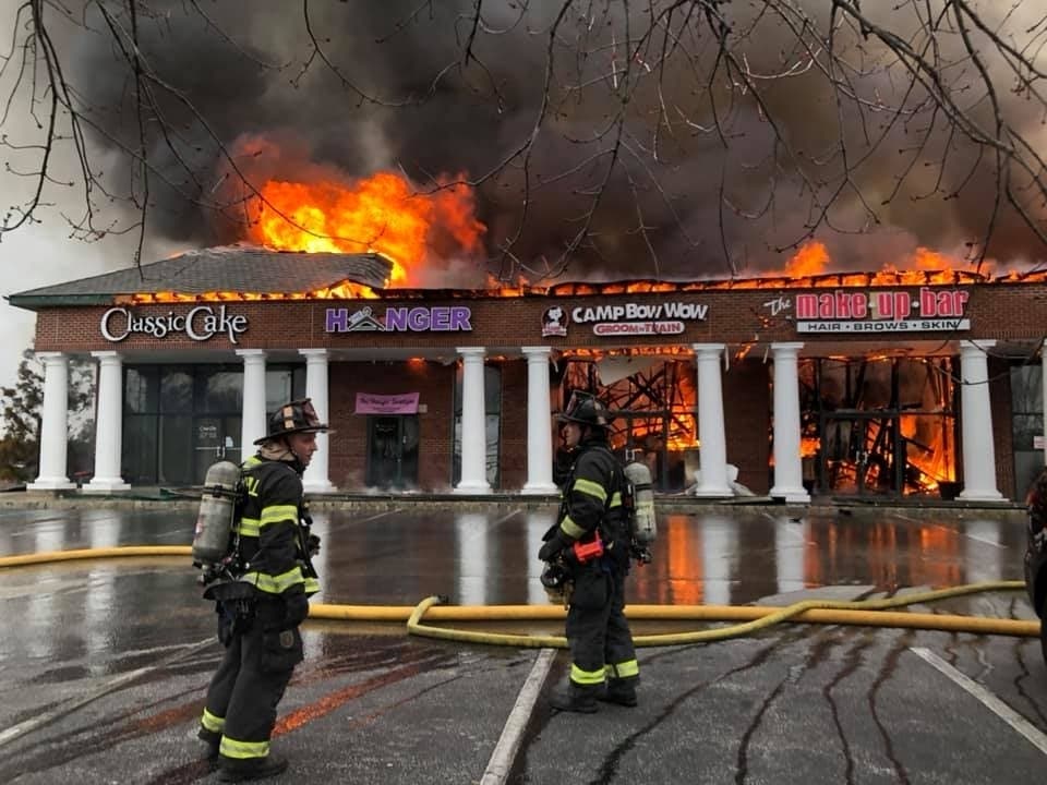A fire consumed businesses at Short Hills Plaza, Cherry Hill police said Friday morning.