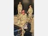 Major john D. Ferrie is back with his family after serving in Kosovo and undergoing a 2-week quarantine due to coronavirus.