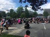 Protesters take a knee in honor of George Floyd at the Cherry Hill Public Library Friday afternoon.