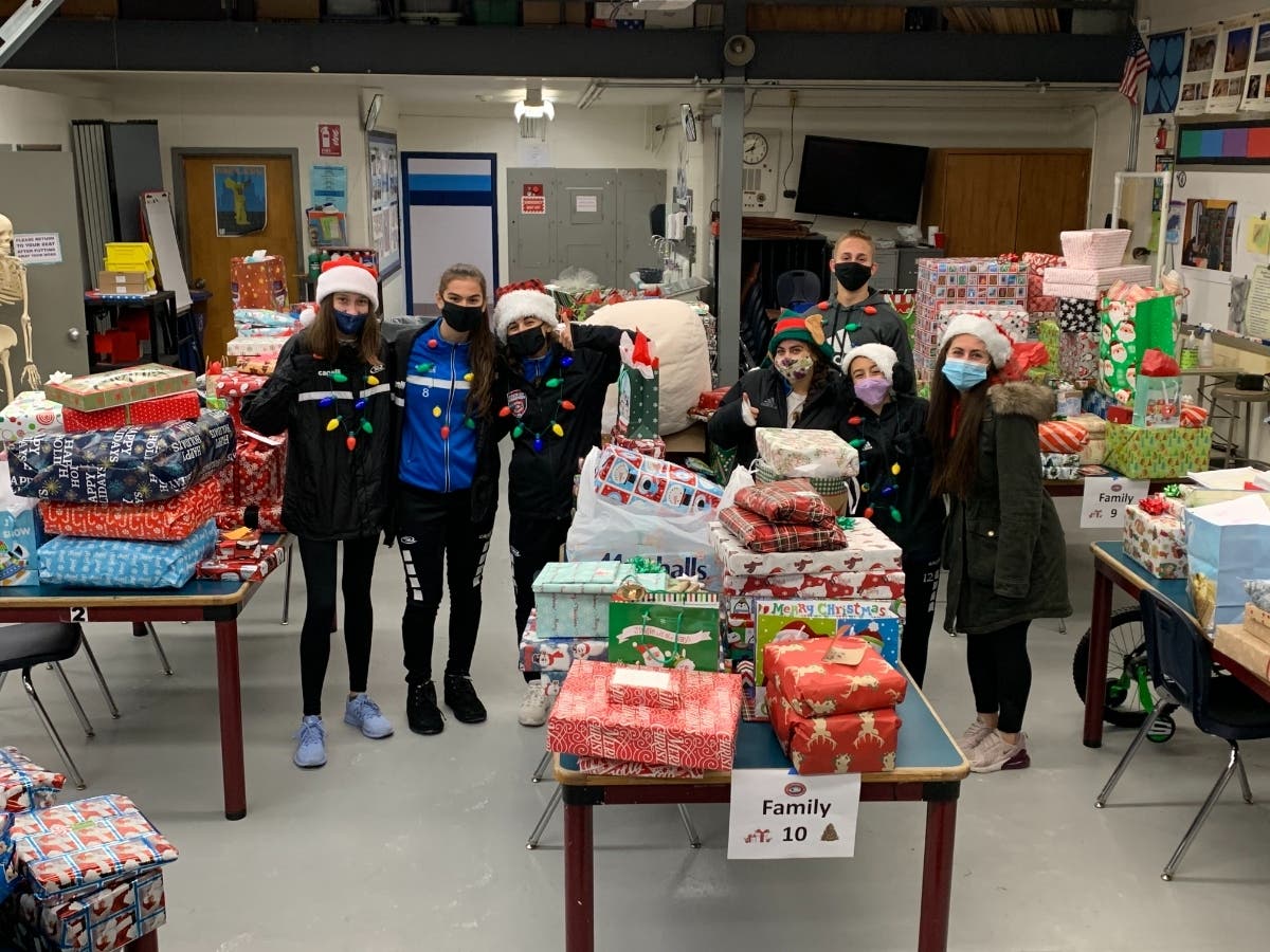 Three Highland Regional High School alum are responsible for helping raise the spirits of 11 struggling families this holiday season.