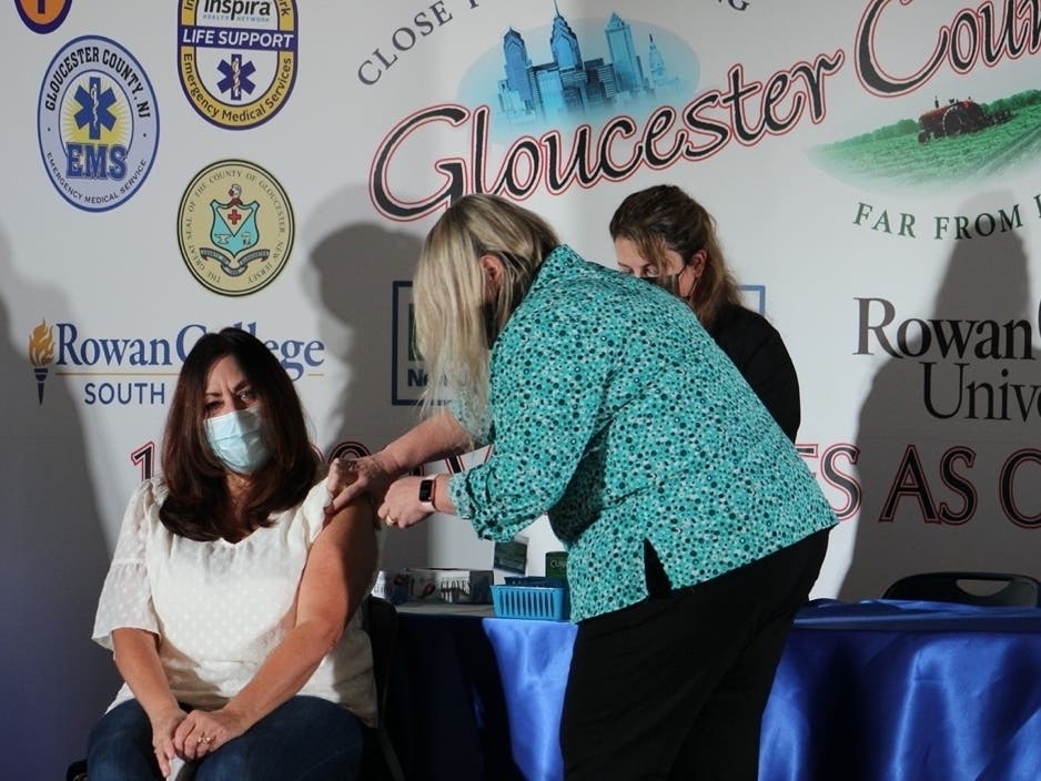 A Pitman woman received the 100,000th COVID-19 vaccination at the state’s “mega-site” in Gloucester County on Sunday.