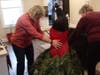 Fairbanks Garden Club Members Jeanette Evans and Annette Eddy help to bring Scarlet to life!