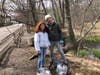 Paquita Bass and her daughter Rosie Plunket with the bags of trash they collected at the Jersey Street Wetlands.