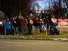 Westford residents gather to hold candles at the Justice for Renee Good vigil