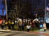 Westford residents gather to hold candles at the Justice for Renee Good vigil