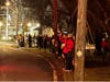 Westford residents gather to hold candles at the Justice for Renee Good vigil