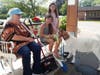 		Resident Cheryl Colletti with Bailey & Sofia Burns as they feed Little Trouble 			