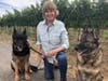Darcie Kent and her beloved Shepherds. 