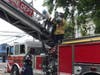 NAR volunteer Bill Snell assists fire crews with the squirrel operation.