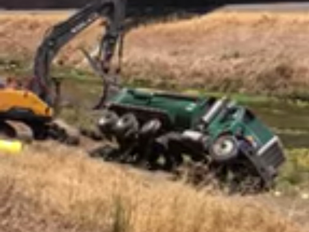 The overturned truck along the I-680 freeway in Pleasanton.