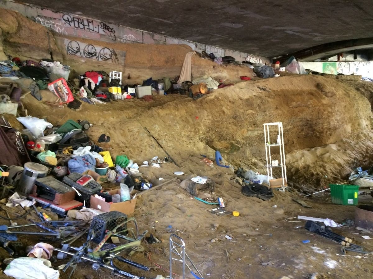 Trash and belongings at Felton Covered Bridge County Park​​.