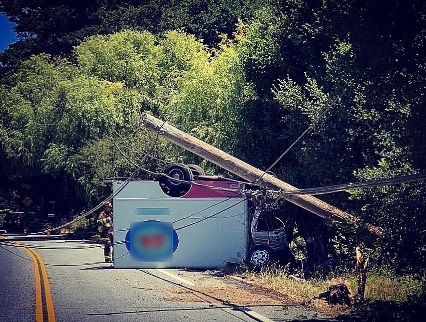 The overturned truck on Freedom Boulevard.