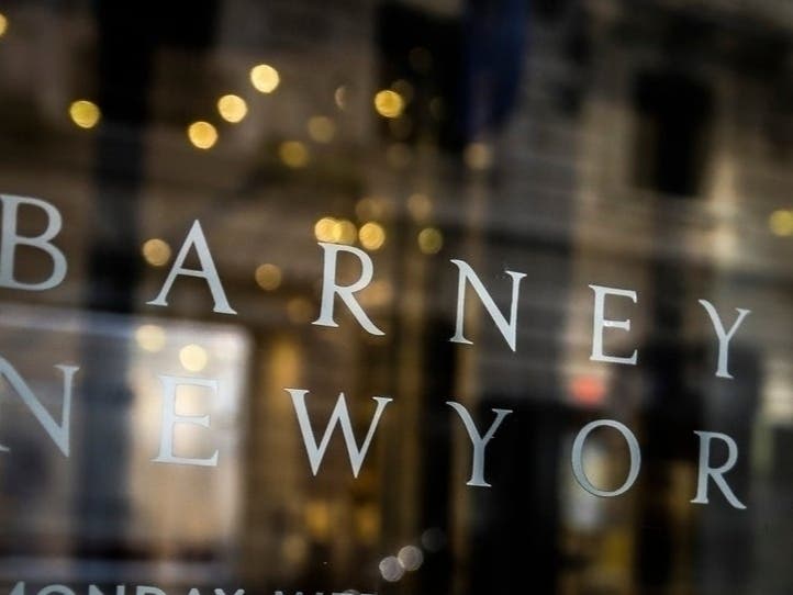 Signage for Barneys New York department store is displayed on the store's window, Tuesday July 16, 2019. 