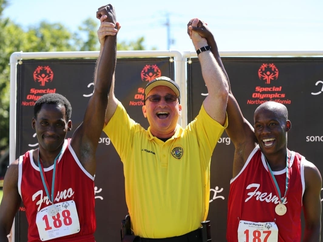 John Hohmann, center.