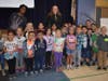 Christian Robinson with students at Joe Michell School.