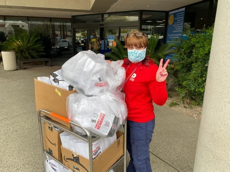 Registered nurse Betty Slimko helping out in the Operation Feed the Front Lines effort in Coachella Valley. Slimko is the sister of the organization's founder, Rancho Mirage Chamber of Commerce CEO Katie Stice​.