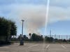 The smoke plume from the fire that was reported around 4 p.m. Friday.