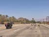 Deputies from the La Quinta Sheriff's Station provide an escort for a family of bighorn sheep.
