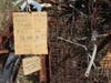 A sign hangs from the cycling shrine near Sleepy Hollow.