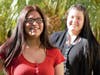 Anahi Reyes, 20, with her social worker Jaqueline Pintado in the background.