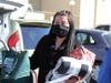 Children’s Services social worker Jaqueline Pintado delivers gifts Monday in Riverside to young adults preparing to leave foster care for independent living. 