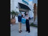 Palm Desert City Council member Sabby Jonathan (left) makes a PPE delivery to Sweet Basil California Eatery on El Paseo.