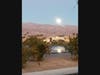 A full moon coming up behind the Chocolate Mountains near the Terra Lago community in Indio.